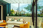 MAYFAIR PENTHOUSE GARDEN, LONDON, PLANTING ALASDAIR CAMERON: TERRACE, ROOF, TABLE, CHAIRS, CONSERVATORY, ECHIUMS, SPARTIUM JUNCEUM, CHAIRS, SEATING, SEATS, INSIDE OUT