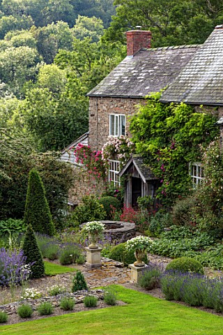 HURDLEY_HALL_POWYS_WALES_SUMMER_JULY_BORDERS_LAVENDER_ROSES_WELL_BORROWED_LANDSCAPE