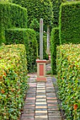 THE LASKETT GARDENS, HEREFORDSHIRE. DESIGNER ROY STRONG: PATHS, CLIPPED, TOPIARY, HEDGES, HEDGING, SIGN, WEST, GREEN, FORMAL, GARDEN, SUMMER, JULY