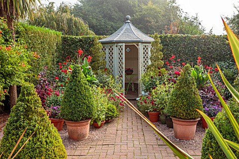 WOLLERTON_OLD_HALL_SHROPSHIRE_PATH_SEPTEMBER_SUMMERHOUSE_SHED_OFFICE_OUTDOOR_OUTSIDE_CLIPPED_TOPIARY
