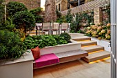 SMALL TOWN, CITY GARDEN DESGNED BY ALASDAIR CAMERON, LONDON: FORMAL, TOWN, GARDEN, NIGHT, LIGHTS, LIGHTING, STEPS, TABLE, CHAIRS, OUTDOOR LIVING, HYDRANGEAS, BENCH, WALLS