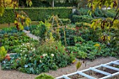 ROCKCLIFFE, GLOUCESTERSHIRE: THE WALLED KITCHEN GARDEN, VEGETABLES, COUNTRY, POTAGER, COPPER CONTAINER, DAHLIAS, CHARD, COSMOS, ARTICHOKES