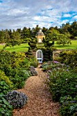 ROCKCLIFFE, GLOUCESTERSHIRE: WALLED GARDEN, WALLS, PATH, BORDERS, GATE, STEPS, DOVECOTE, BUILDING, TOPIARY BIRDS