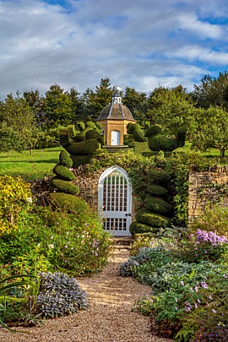 ROCKCLIFFE_GLOUCESTERSHIRE_WALLED_GARDEN_WALLS_PATH_BORDERS_GATE_STEPS_DOVECOTE_BUILDING_TOPIARY_BIR
