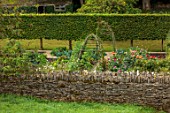 ROCKCLIFFE, GLOUCESTERSHIRE: POTAGER, VEGETABLE, KITCHEN, GARDEN, COUNTRY, HEDGES, HEDGING, DAHLIAS, COSMOS, WALLS