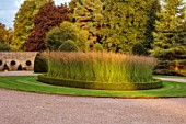 BOWCLIFFE HALL, YORKSHIRE: DESIGN ALISTAIR BALDWIN: THE MAIN DRIVE WITH CIRCLE OF MOLINIA SKYRACER, LAWN, SEPTEMBER
