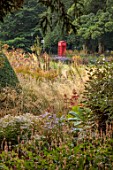 BOWCLIFFE HALL, YORKSHIRE: DESIGN ALISTAIR BALDWIN: SEPTEMBER, BORDERS, GRASSES AND PERENNIALS, TELEPHONE BOX
