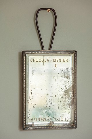 PEAR_TREE_COTTAGE_OXFORDSHIRE_MASTER_BEDROOM_VINTAGE_FRENCH_CHOCOLAT_MENIER_FOXED_GLASS_MIRROR