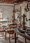 CEST TOUT INTERIORS: THE BARN SHOP,  ASSORTED VINTAGE FRENCH TABLES, CHAIRS, CHANDELIERS