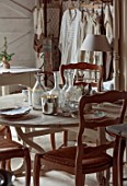 CEST TOUT INTERIORS: THE BARN SHOP,  ASSORTED VINTAGE FRENCH TABLES, CHAIRS, CHANDELIERS