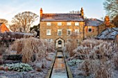 THE OLD RECTORY, QUINTON, NORTHAMPTONSHIRE: DESIGNER ANOUSHKA FEILER: RILL, RECTORY, GRASSES, FROST, WINTER, FROSTY GARDEN, ENGLISH, COUNTRY, JANUARY, WATER, CANAL