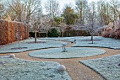 THE OLD RECTORY, QUINTON, NORTHAMPTONSHIRE: DESIGNER ANOUSHKA FEILER: FROST, WINTER, ENGLISH, COUNTRY, PATHS, LAWN, JANUARY, HEGDES, SAWN SCULPTURE BY MICHELLE PARKER