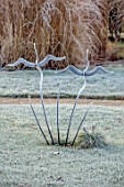 THE OLD RECTORY, QUINTON, NORTHAMPTONSHIRE: DESIGNER ANOUSHKA FEILER: METAL BIRD SCULPTURE ON LAWN, ORNAMENT, WINTER, FROST, JANUARY