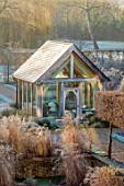 THE OLD RECTORY, QUINTON, NORTHAMPTONSHIRE: DESIGNER ANOUSHKA FEILER: GRASSES, FROST, WINTER, JANUARY, SUMMERHOUSE, BUILDING, OUTDOOR OFFICE