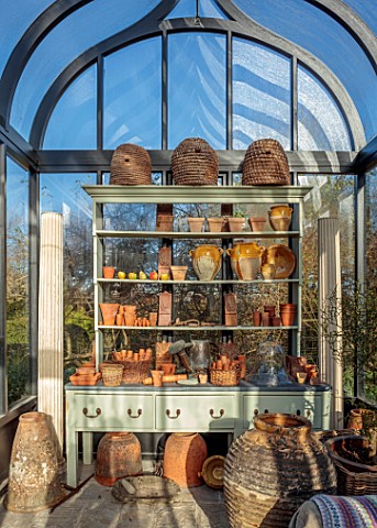 LOWER_BOWDEN_MANOR_BERKSHIRE_NEW_CONSERVATORY_DRESSER_TERRACOTTA_CONTAINERS