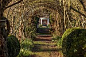 LOWER BOWDEN MANOR, BERKSHIRE: JANUARY, WINTER, PATH TO TEMPLE GARDEN, ARCHWAY, PERGOLA, ANCIENT RAMBLER ROSE