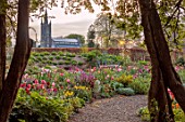 PATTHANA GARDEN, IRELAND: MAY, THE NEW TORC GARDEN MADE IN 2020, TULIPS, SPRING, MAY, CHURCH, PATHS, DAWN LIGHT
