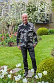 PATTHANA GARDEN, IRELAND: OWNER T J MATHER WITH TULIP PURISSIMA, MAY, SPRING
