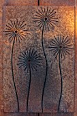 DESIGNER JAMES SCOTT, THE GARDEN COMPANY: RUSTY METAL PANEL WITH CUT OUT ALLIUMS