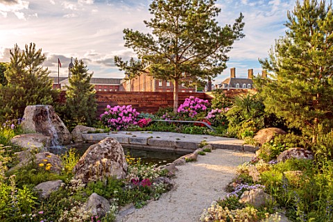 CHELSEA_2022_A_SWISS_SANCTUARY_BY_LILLY_GOMM_PATH_ALPINE_PLANTING_ROCKS_WATERFALL_RHODODENDRONS_META