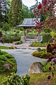 COWDEN JAPANESE GARDEN, SCOTLAND: THE DRY GARDEN, ROCKS, GRAVEL, TREES, MOSS, WOODEN TEA HOUSE