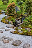COWDEN JAPANESE GARDEN, SCOTLAND: THE DRY GARDEN, ROCKS, GRAVEL, TREES, MOSS, AZALEAS, STONE, BAMBOO WATER FEATURE