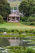 ENCOMBE HOUSE, DORSET: WATER, LAKE, TEMPLE, LAWN, HILLS, DUCK HOUSE, WATERLILIES