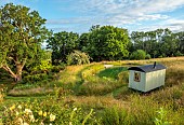 HIGHLANDS, EAST SUSSEX: MEADOW, SHEPHERDS HUT, LAKE, POND, POOL, SWIMMING, WATER, WOODLAND, TREES