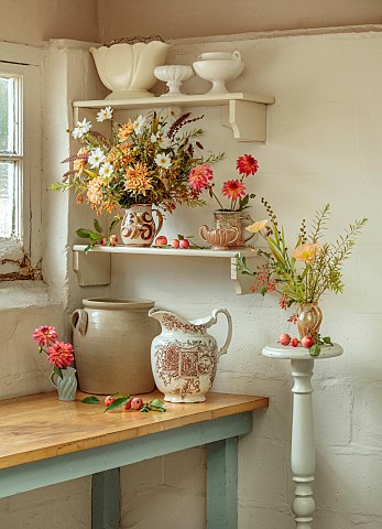 GREEN_AND_GORGEOUS_FLOWERS_OXFORDSHIRE_CORNER_OF_FLOWER_ROOM_JUGS_CONTAINERS_CHRYSANTHEMUM_SALMON_AL