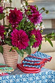 ASHBROOK HOUSE, NORTHAMPTONSHIRE: MOLLY MAHON PRODUCTS ON TABLE, DAHLIAS IN VASE