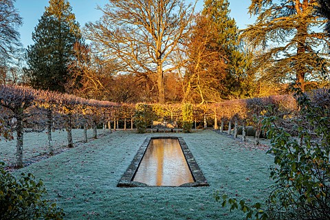 ROCKCLIFFE_GARDEN_GLOUCESTERSHIRE_LAWN_FORMAL_POND_POOL_WATER_FROST_FROSTY_ENGLISH_COUNTRY_GARDEN_WI