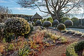 ORDNANCE HOUSE, WILTSHIRE: FROST, FROSTY, WINTER, BOX, HEDGE, HEDGING, SUMMERHOUSE, FORMAL, COUNTRY, GARDEN, PORTUGUESE LAUREL, PATHS
