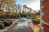 MORTON HALL GARDENS, WORCESTERSHIRE: PATH, STATUE, CLIPPED TOPIARY BOX, BUXUS, TREES, FORMAL, GARDEN, WINTER, SNOW, FROST
