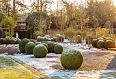 MORTON HALL GARDENS, WORCESTERSHIRE: PATH, STATUE, CLIPPED TOPIARY BOX, BUXUS, TREES, FORMAL, GARDEN, WINTER, SNOW, FROST