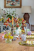 TABLE DECORATED BY ANNETTE WARREN: FLOWERS, BLOOMS OF PARROT TULIP, TULIP RASTA PARROT, BULBS, APRIL
