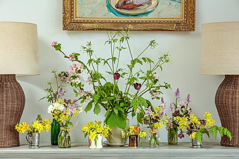 DRESSER_DECORATED_BY_ANNETTE_WARREN_NATURAL_FORAGED_FLOWERS_BLOOMS_OF_BULBS_APRIL_COWSLIPS_PINK_BLUE