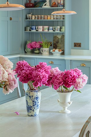 PRIVATE_GARDEN_DEDHAM_VALE_SUFFOLK_KITCHEN_TABLE_REPRODUCTION_OF_A_FRENCH_MONASTERY_TABLE_PEONIES_KI
