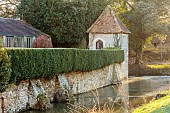 BECKLEY PARK, OXFORDSHIRE: FROST, FROSTY, WINTER, HOUSE, CLIPPED TOPIARY, HEDGES, HEDGING, YEW, MOAT