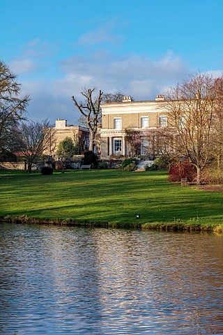 HORKESLEY_HALL_ESSEX_WINTER_FEBRUARY_DAWN_LIGHT_MORNING_LIGHT_LAWN_LAKE_HOUSE_REFLECTED_REFLECTIONS