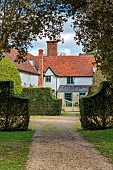COLUMBINE HALL, SUFFOLK: THE MAIN PATH, ENTRANCE TO THE HALL, HEDGES, GATE, MARCH