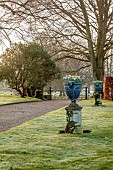 COTTESBROOKE HALL AND GARDENS, NORTHAMPTONSHIRE: MARCH, SPRING, CONTAINERS WITH NARCISSUS AND MUSCARI