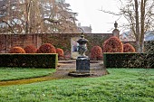 COTTESBROOKE HALL AND GARDENS, NORTHAMPTONSHIRE: SPRING, MARCH, THE REFLECTING POOL, CLIPPED BEECH TOPIARY