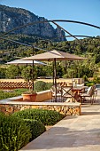 PRIVATE GARDEN ALARO, MALLORCA, DESIGNED BY MASHAMBA DESIGN: TERRACE, PATIO, TABLE, CHAIRS, PARASOL, MOUNTAINS