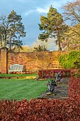 COTTESBROOKE HALL, NORTHAMPTONSHIRE: THE POOL GARDEN, CLIPPED BEECH HEDGES, HEDGING, URNS, CONTAINERS PLANTED WITH TULIP NEGRITA PARROT, SPRING, APRIL