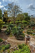 DODDINGTON PLACE, KENT: APRIL, SPRING, THE ROCK GARDEN, PATHS