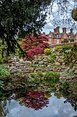 DODDINGTON PLACE, KENT: LARGE POOL, POND, HOUSE, QUARRY, ROCK GARDEN, MAPLES, ACERS, WATER, REFLECTIONS, REFLECTED, STREAM