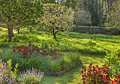 CAISSON GARDEN, SOMERSET: THE WALLED GARDEN AND ORCHARD, APRIL, SPRING: ORNAMENTAL VEGETABLE AND CUT FLOWER BEDS, BLOSSOM, CHIVES, WALLFLOWERS