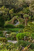 TRESCO ABBEY GARDEN, ISLES OF SCILLY: THE OLD ABBEY RUINS SEEN FROM THE TOP TERRACE, MAY, SPRING