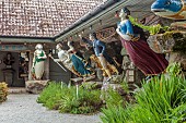 TRESCO ABBEY GARDEN, TRESCO,  ISLES OF SCILLY: MAY, VALHALLA - COLLECTION OF SHIPS FIGUREHEADS COLLECTED BY AUGUSTUS SMITH FROM SHIPWRECKS AROUND THE ISLES OF SCILLY