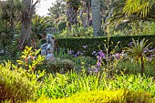 TRESCO ABBEY GARDEN, ISLES OF SCILLY: MAY, SPRING, SCULPTURE OF GAIA, THE EARTH MOTHER